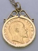 EDWARD VII 1910 GOLD HALF SOVEREIGN - with a 9ct mount and chain, 6.7grms