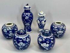 LATE 19TH CENTURY CHINESE BLUE & WHITE PRUNUS PATTERN GINGER JARS (4), two with covers, 15cms H, a