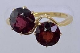 18CT GOLD DRESS RING - with two large crossover garnets, Size Q, 4.5grms