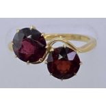 18CT GOLD DRESS RING - with two large crossover garnets, Size Q, 4.5grms