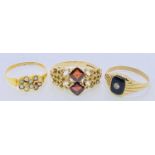 15CT GOLD DRESS RING - decorated with tiny seed pearls and one small ruby, Size N, 1.6grms, a 9ct