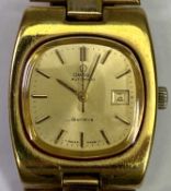 OMEGA - lady's yellow metal wristwatch, automatic with square dial