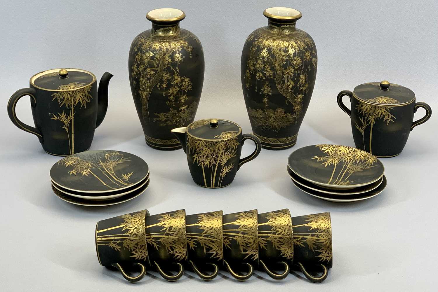 JAPANESE SATSUMA BLACK LACE TEA SERVICE - gilded bamboo shoots and leaves on a black ground, teapot,