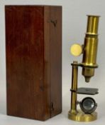 SCIENTIFIC INSTRUMENTS - a lacquered brass monocular microscope, 20.5cms H, contained in fitted