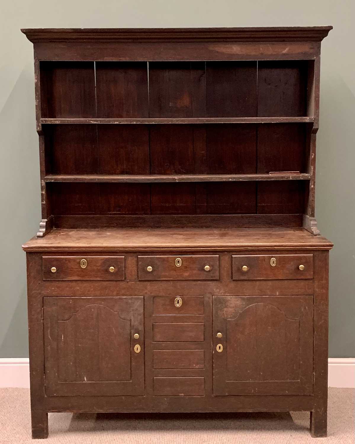 EARLY 19th CENTURY OAK WELSH DRESSER, the three shelf rack with wide backboards over a base of three