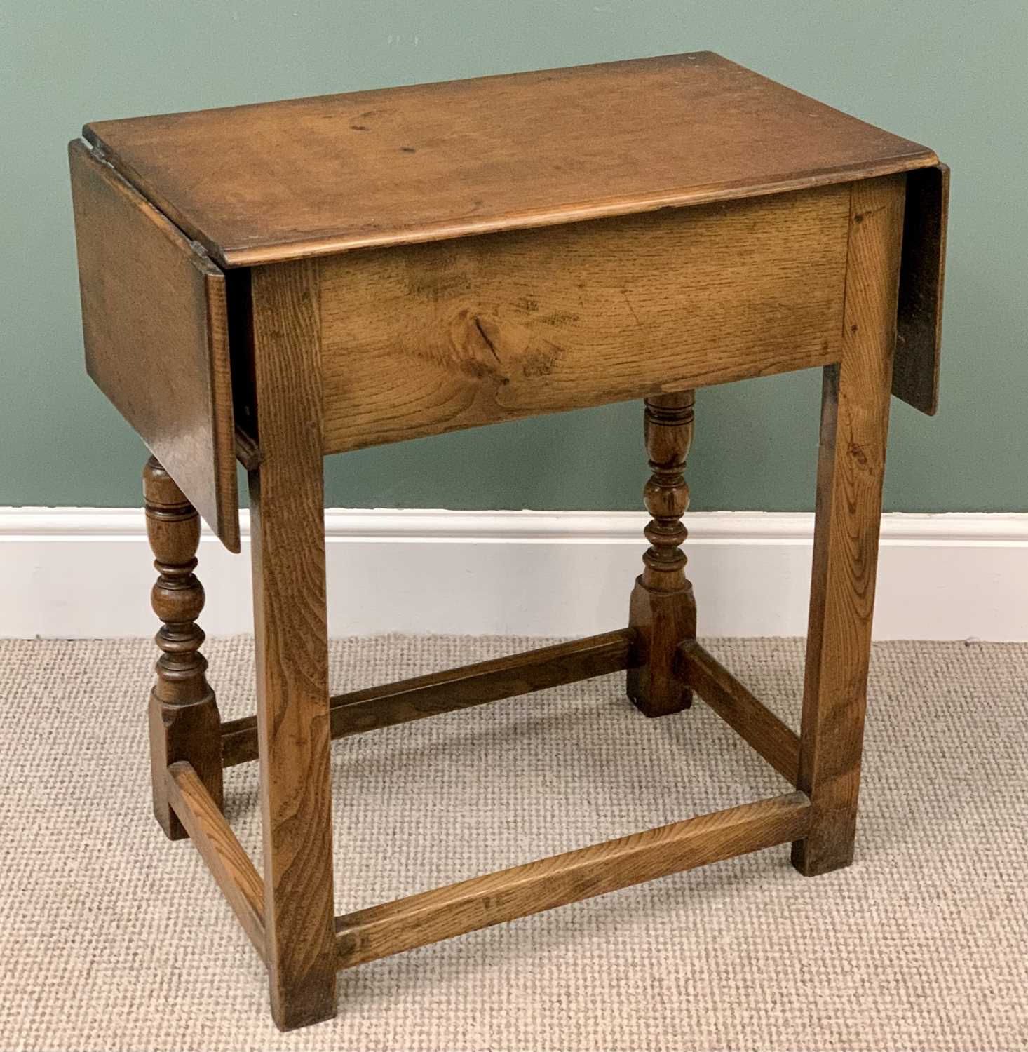 RUSTIC OAK & CARVED SINGLE DRAWER SIDE TABLE with twin flap ends, on turned and block supports, - Image 3 of 3