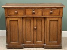 VICTORIAN PINE SIDEBOARD having three upper drawers and twin central cupboard doors to an inverted