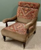 VINTAGE ARMCHAIR with colourful upholstery on turned supports and castors, 88cms H, 73cms W, 60cms