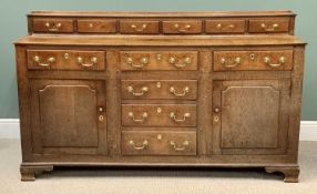 GEORGE III OAK WELSH DRESSER BASE with a top row of six spice drawers, over a T-arrangement of six