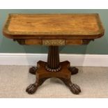 ANTIQUE MAHOGANY FOLDOVER TEA TABLE with brass inlay, on reeded column support and quatrefoil base