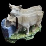 19th century English pottery pair of cows