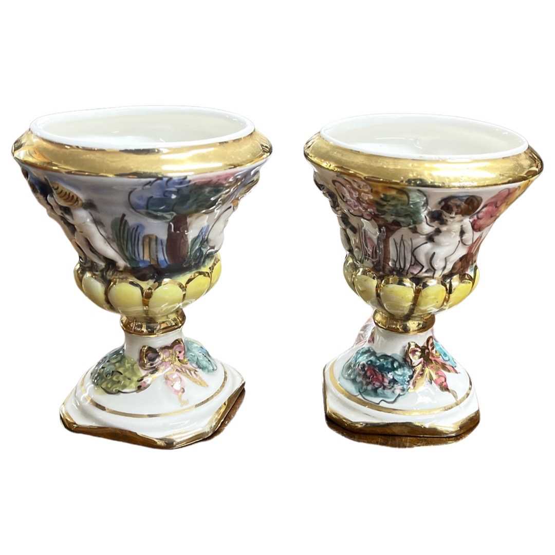 A pair of Capodimonte urns