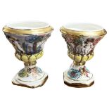 A pair of Capodimonte urns