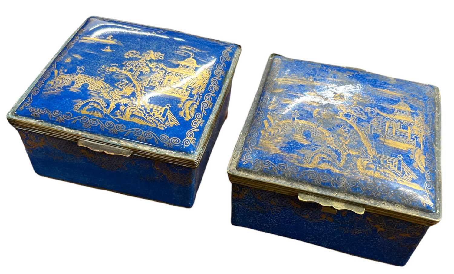 A pair of 20th century Crown Staffordshire blue trinket boxes with gold hand painted decoration