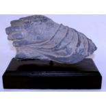 An ancient grey Gandhara Schist fragment of a hand, probably 12th century