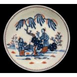 An 18th century Liverpool soft paste saucer by Seth Pennington in Chinese Mandarin pattern