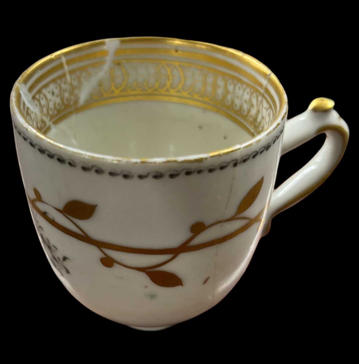 An 18th century Chinese coffee cup with gold floral decoration