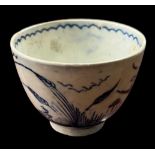 A late 18th century English pearlware cup with traditional Chinese scene decoration