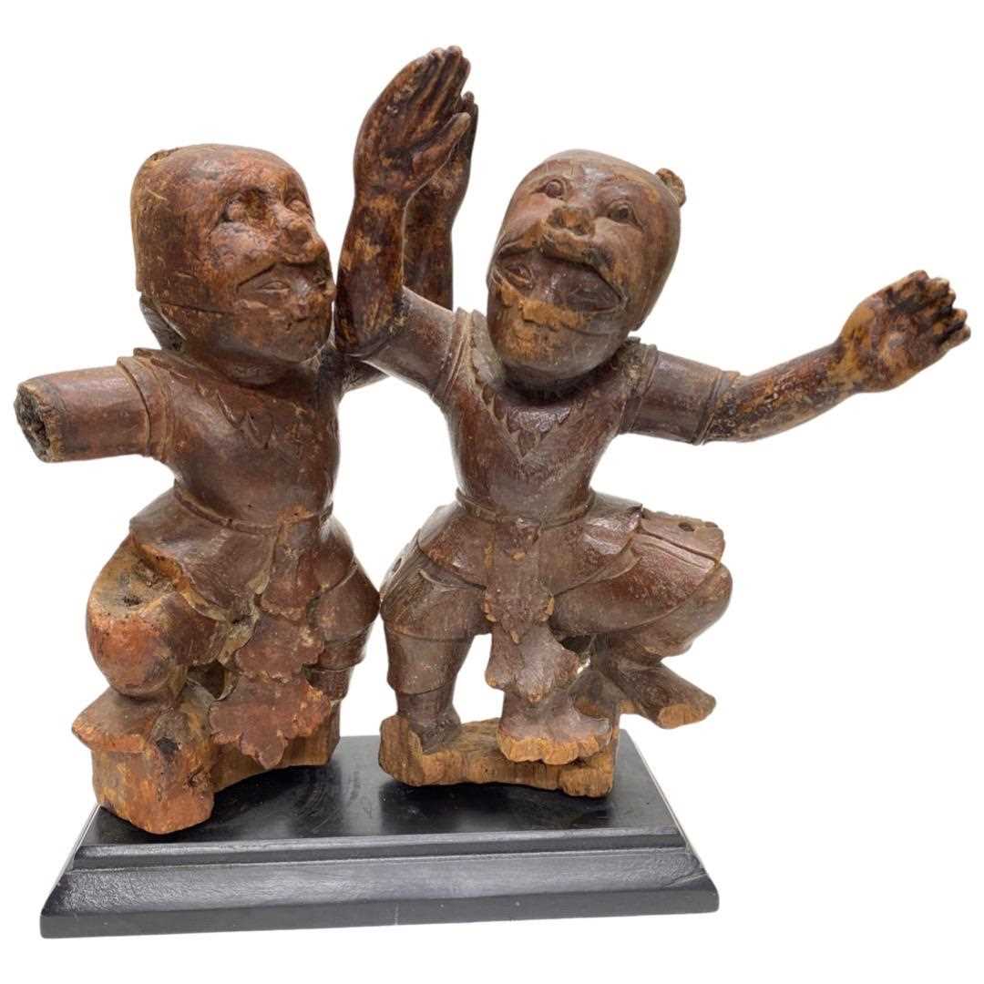 A Pair of Carved Wood 19th Century Indonesian Dancing Figures;