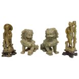 A Pair of Chinese Carved Hard Stone Figures and a Pair of Hard Stone Dogs of Fo