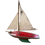 Pond Yacht. 'Star Yacht', Birkenhead. Red and Green painted hull. Label to deck. 'Guaranteed to Sail