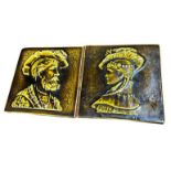 A pair of Majolica Sarreguemines 'King and Queen' tiles