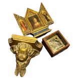 Three reproduction items comprising Triptych, Sundial and Cherub Bracket