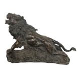 A Mid 20th Century Patinated Bronze Model of a Roaring Lion