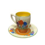 A Clarice Cliff Lynton Coffee Cup and Saucer in Autumn Crocus