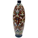 A French enamelled decorated pottery vase