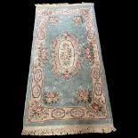 20th Century Chinese Blue Ground Rug with Floral Pattern