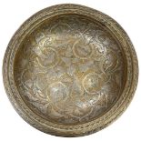 A Syrian bronze silver-inlaid shallow bowl