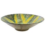 A 19th Century sgraffito ochre, yellow and green decorated bowl