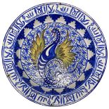 A Blue and White and Gold Hispanic charger, decorated with a seahorse