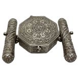 An Islamic embossed silver-coloured metal Bazuband box