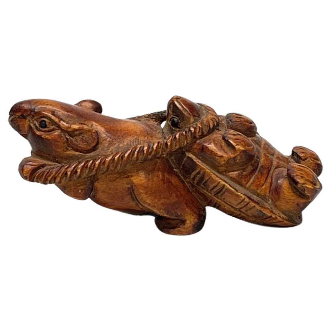 A Carved Wooden Netsuke in the Form of a Rat Pulling a Turtle