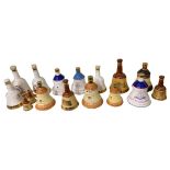 A Collection of Sixteen Commemorative Bells Whisky Decanters