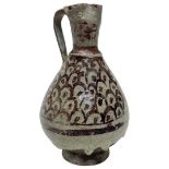 A Raqa Brown celadon-glazed ewer