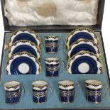 Cased Set of 6 Silver Teacup Holders with Aynsley Cups and Saucers. Sheffield 1928, James Dixon & So