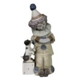 A Lladro Clown Playing Accordion to a Dog