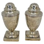 Matched Pair of Silver Casters. 73 g. Both George Unite, Birmingham and Chester 1905 and 1903