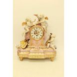 A Sevres Style Pink Porcelain with Angels Mantel Clock