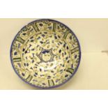 A Qajar Bowl with Bird Decoration
