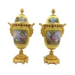 PAIR OF 19TH CENTURY SEVRES STYLE PORCELAIN AND ORMOLU LIDDED VASES