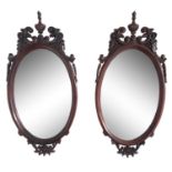 PAIR OF ANTIQUE VICTORIAN OVAL MAHOGANY MIRRORS,