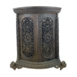 "HEAVILY CARVED ANGLO INDIAN CORNER CABINET, 19TH CENTURY "