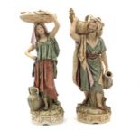 PAIR OF ROYAL DUX BOHEMIA PORCELAIN FIGURES OF AN EASTERN WATER BEARER AND HIS COMPANION