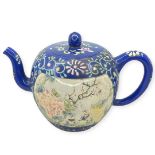 A Yixing Clay Glazed and Enamelled Teapot.