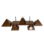 4 Graduated Polished Wooden Pyramids and a Further Wooden Piece with Graduated Circular Pieces