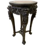 A Marble Topped Carved Jardinere Stand